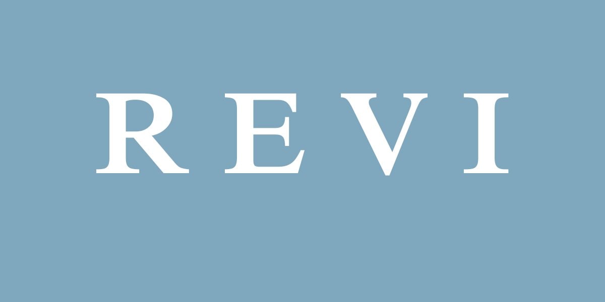 REVI wellness brand logo on a light blue background.